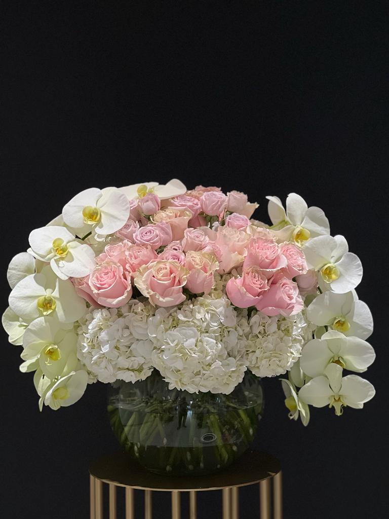 "Exquisite Anniversary Flowers - The Perfect Anniversary Gift"-vase arrangement of roses, orchids and hydrangeas