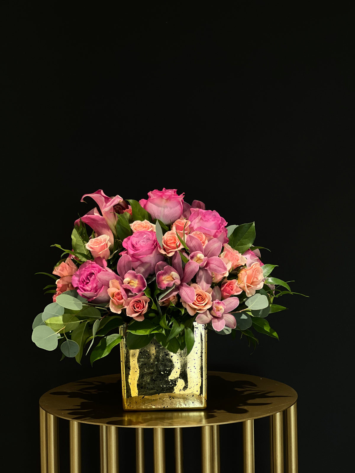 "Sweet Pink and Lavender Bloom Bouquet: Elegant Roses, Spray Roses, and Mini Calla Lilies in a Glass Vase – Perfect for Anniversaries, Congratulations, or Birthdays. Flower Delivery in GTA by Yonge Florist."