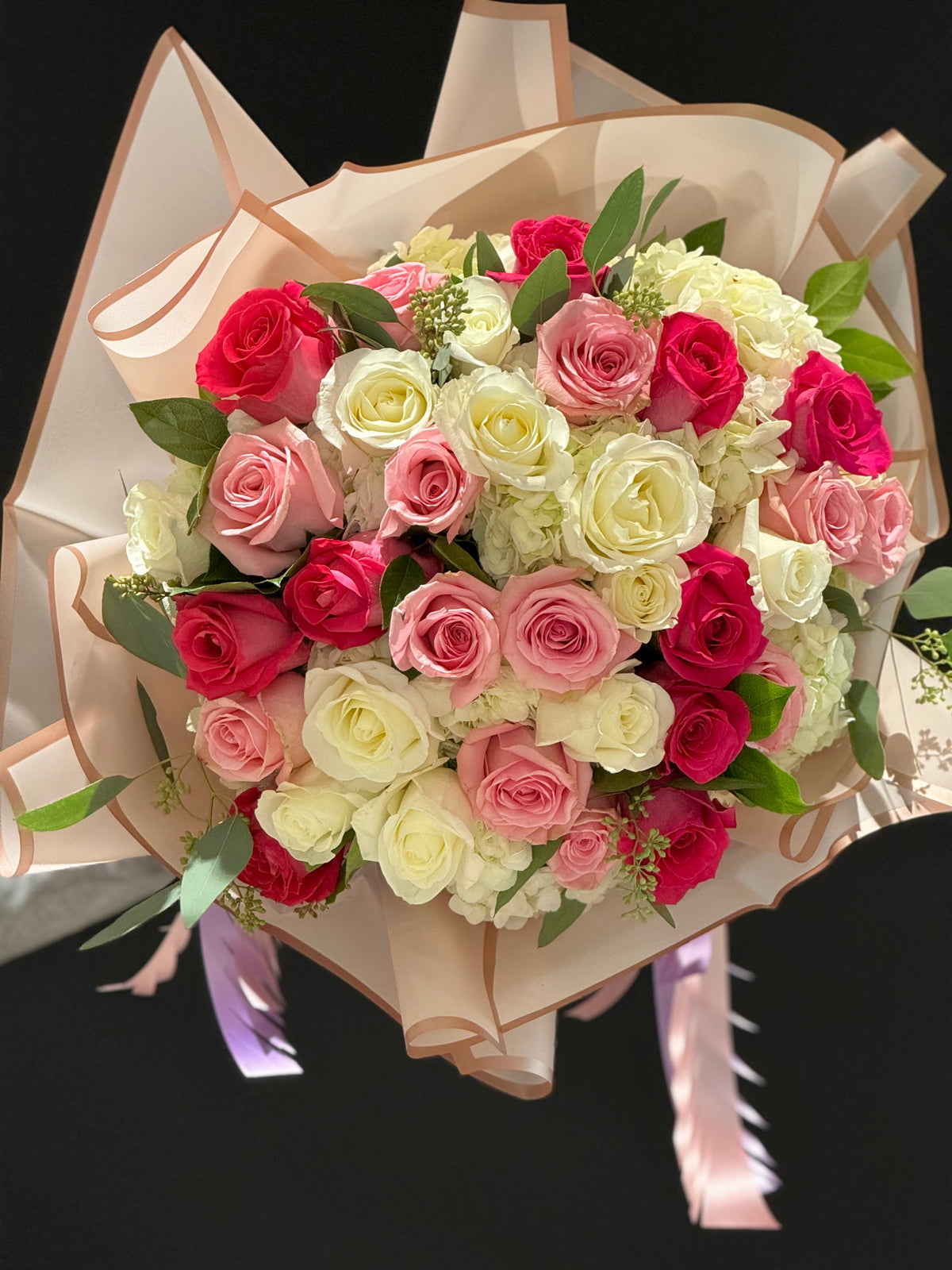 Radiate joy with Yonge Florist's "You Are My Rainbow Bouquet". Perfect for any occasion. Order now for vibrant roses, hydrangeas, and timely local/GTA delivery! more zoomed in